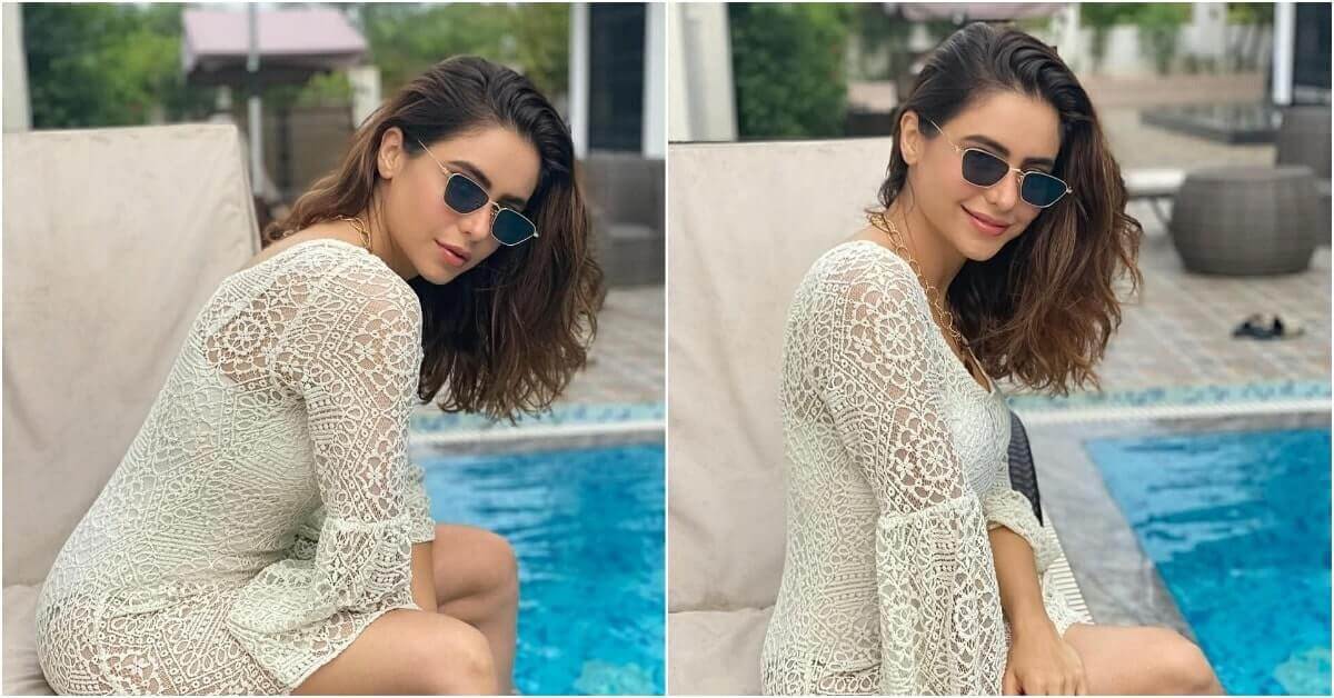 Aamna Sharif Soaring Temperatures High As She Is Posing Beside Pool In Mini Dress